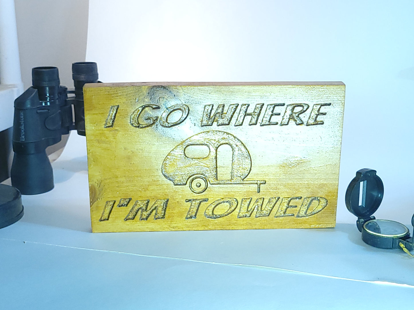 "I Go Where I'm Towed" wooden sign